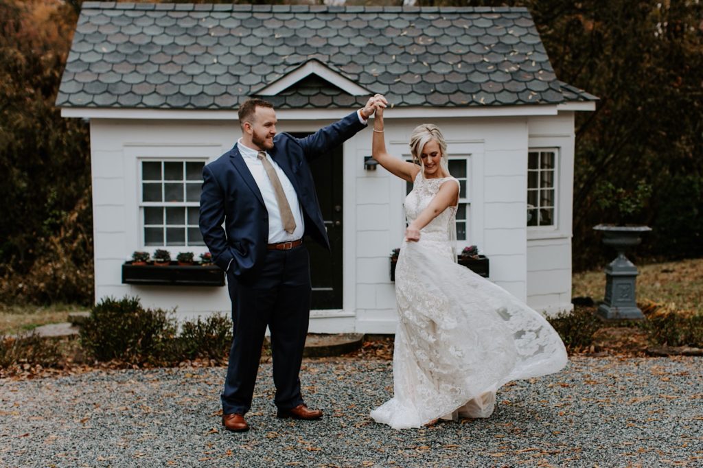 Newlyweds dancing at ritchie hill during their fall wedding